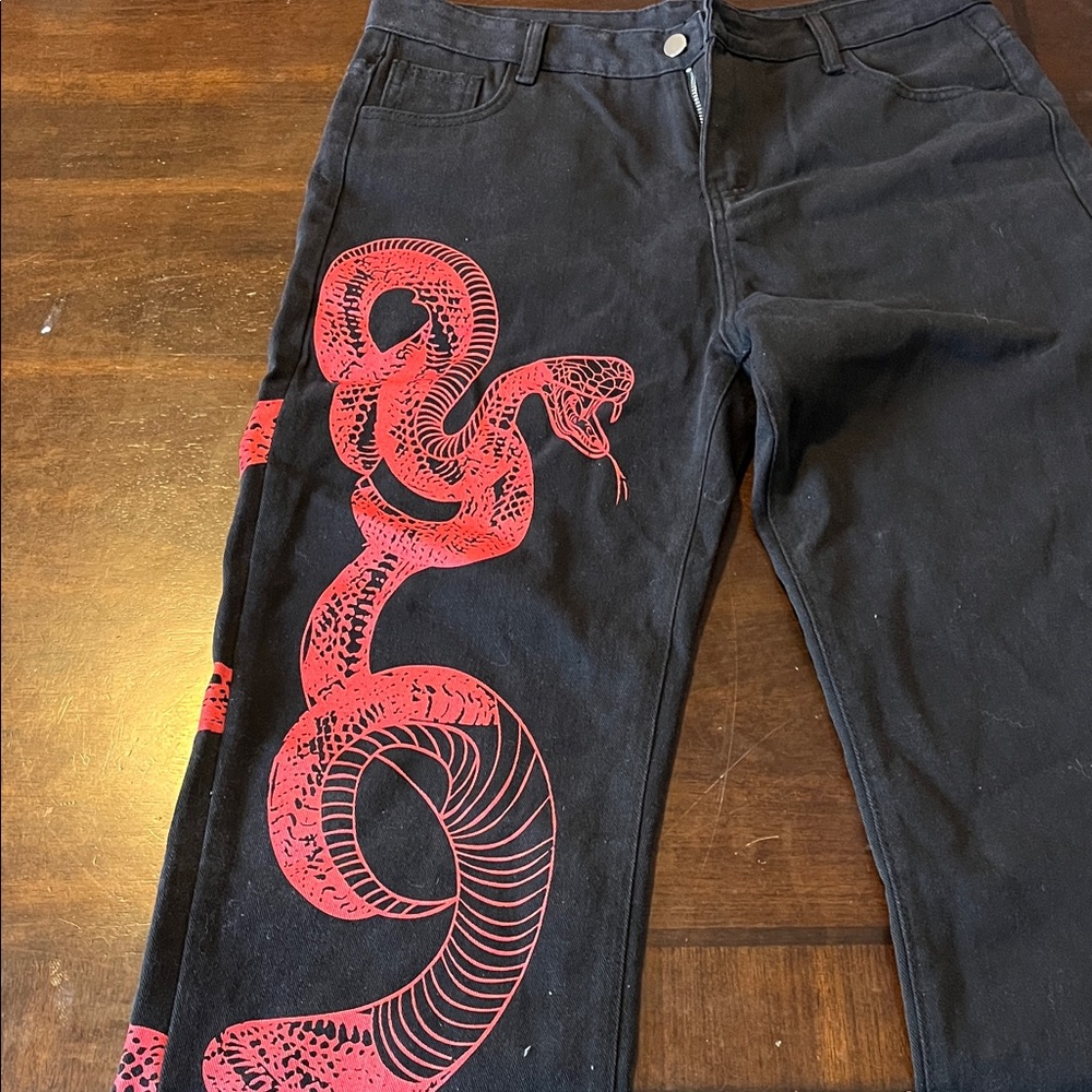 Black Jeans with Red Snake Design